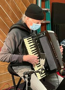 A masked up Don Stille plays accordion on Frank Lamphere's "Now, That's Amore!" CD