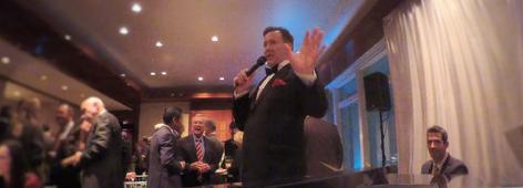 Lamphere crooning "That's Amore" in a penthouse above Central Park NY